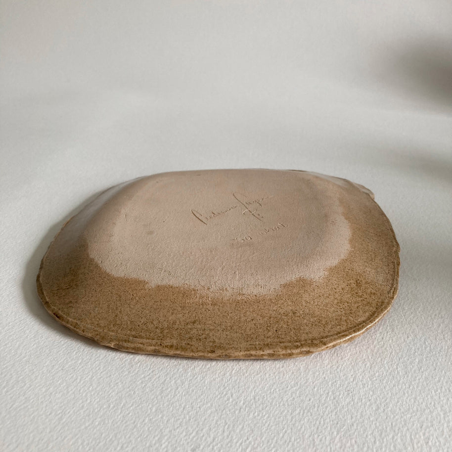 Artist Made Pottery Plate: Tribal Faces, Speckled Tan Glaze, Signed